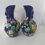 Pair of hand-painted earthenware cruet jug vases. Numbered