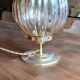 Globe table lamp in amber chiseled glass