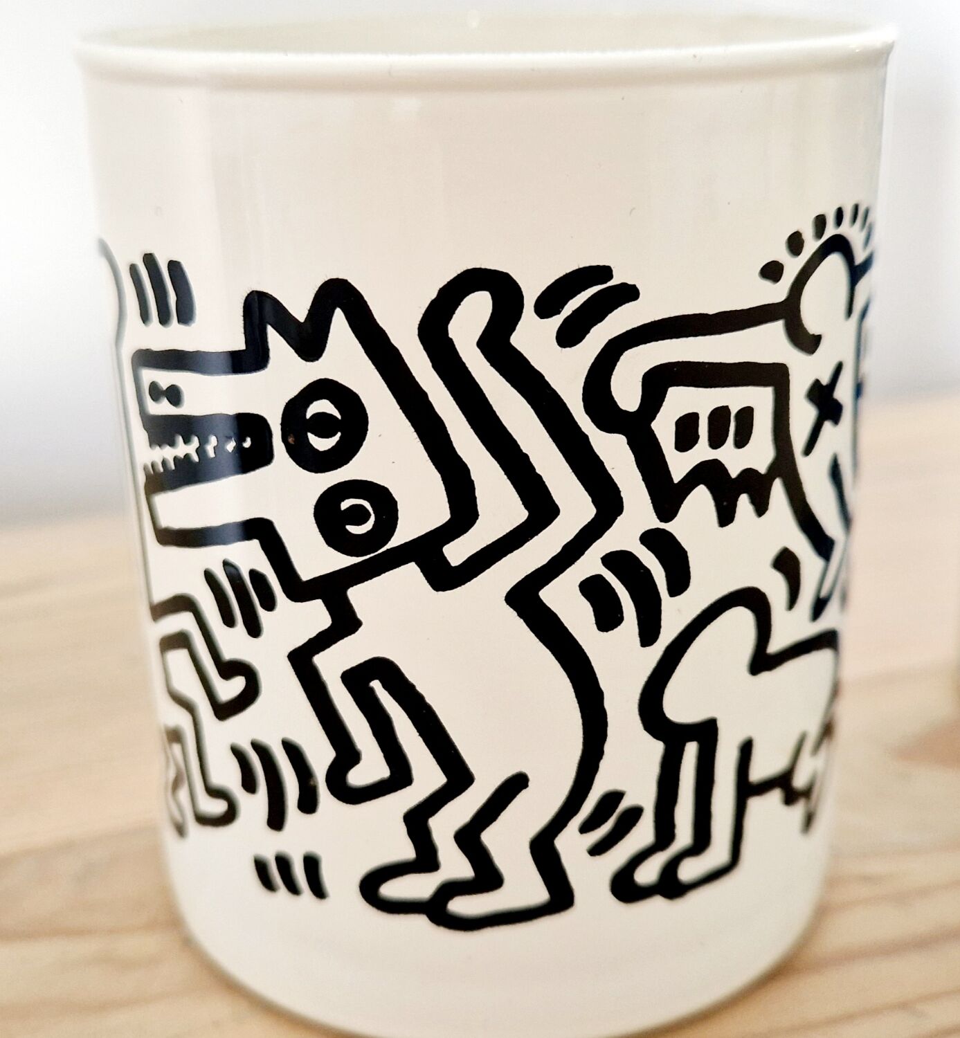 Pair of Keith Haring pots in opaline.