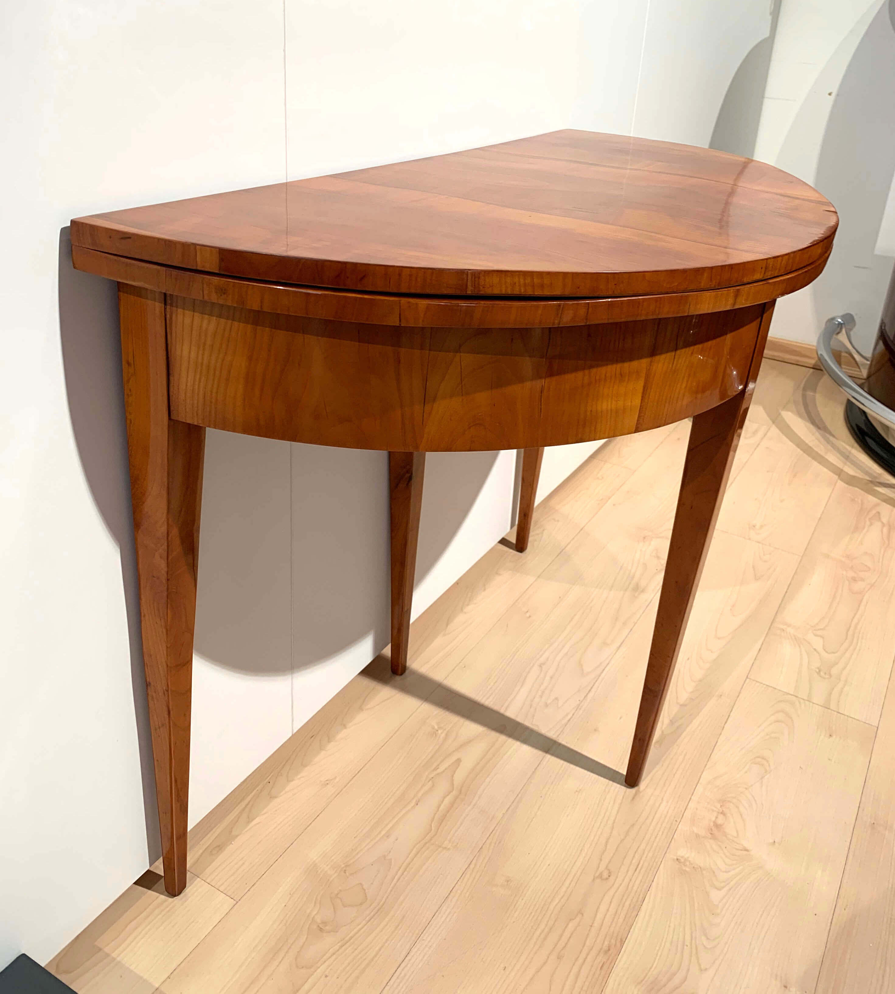 Biedermeier demi-lune fold-out table, cherry veneer, south germany, circa 1820