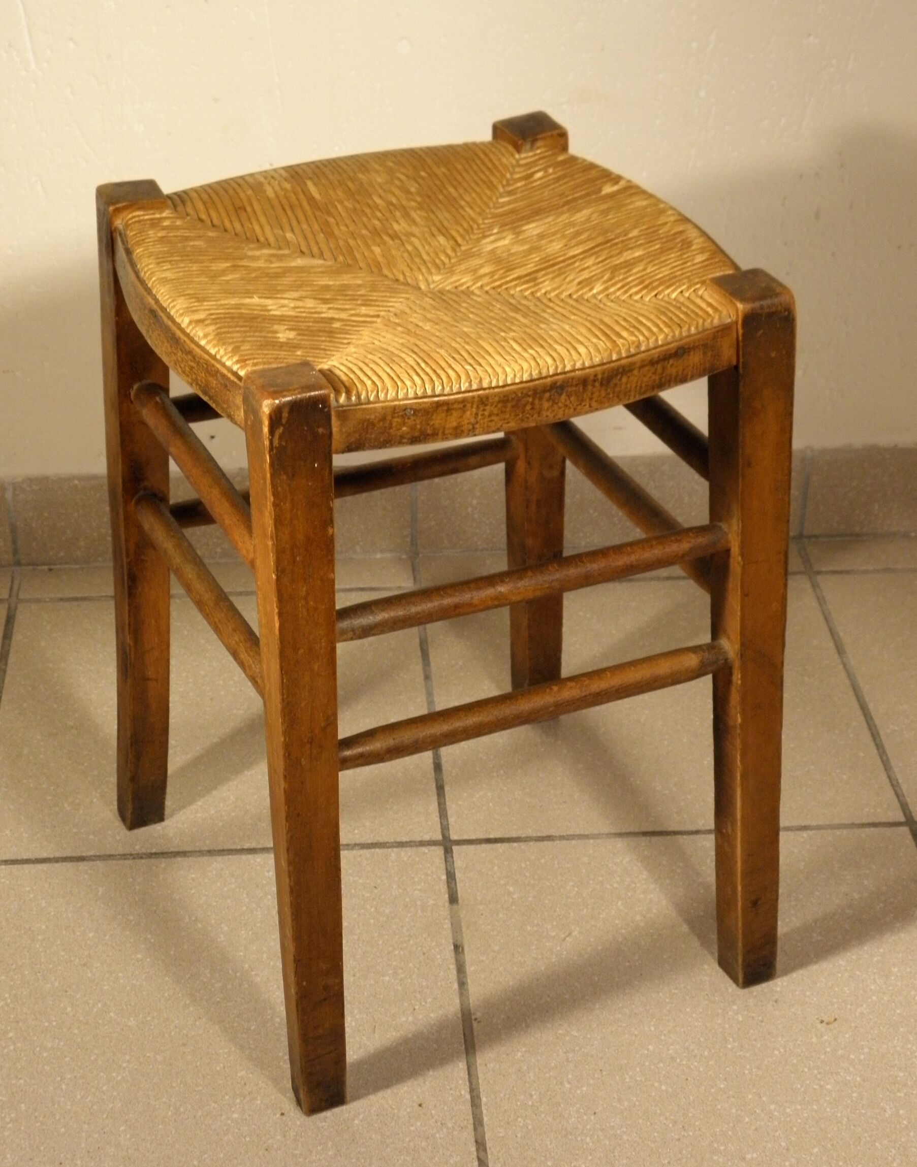 Wood and straw farm stool