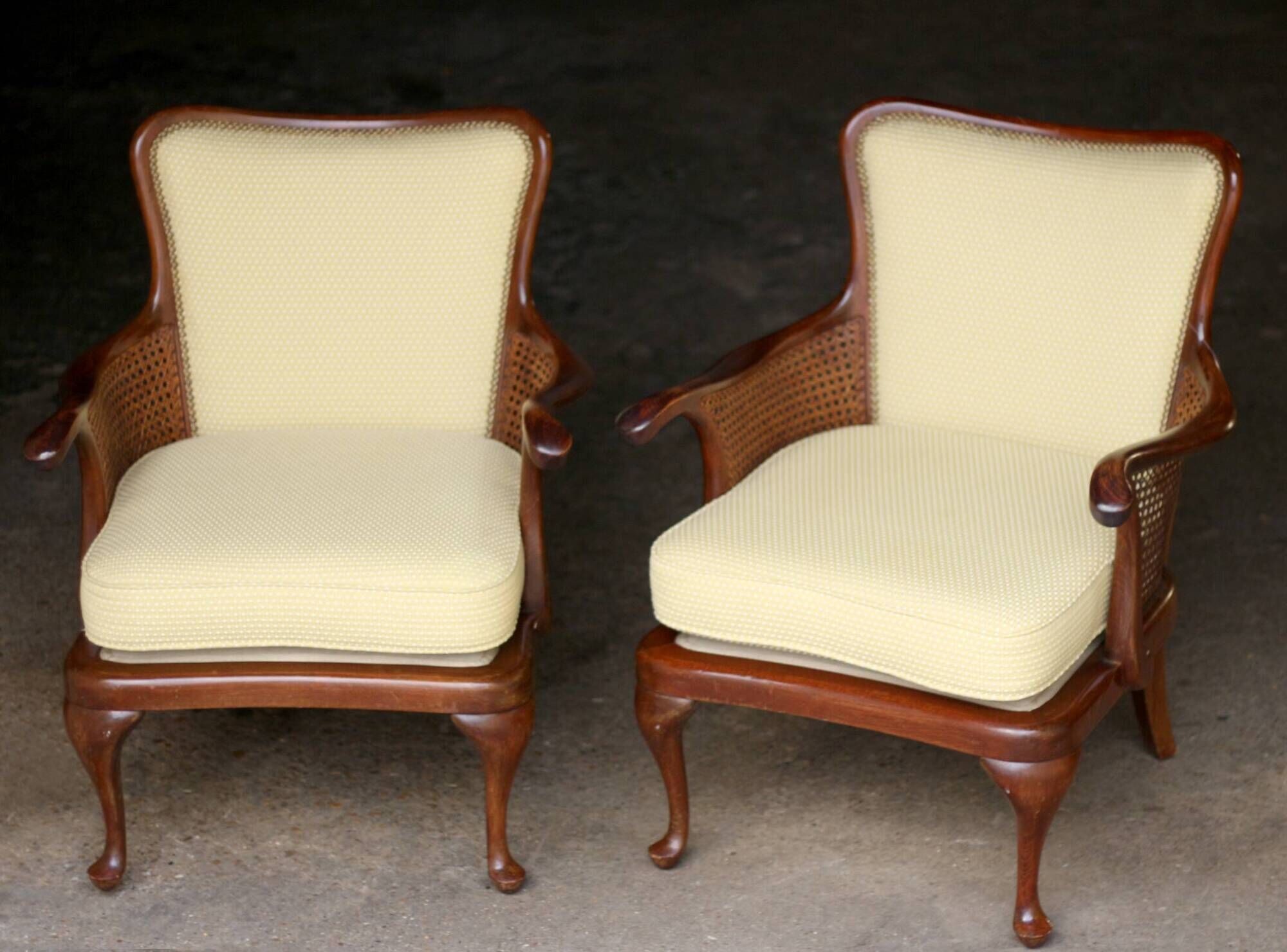 pair of mahogany and cane armchairs. English work (1960s).