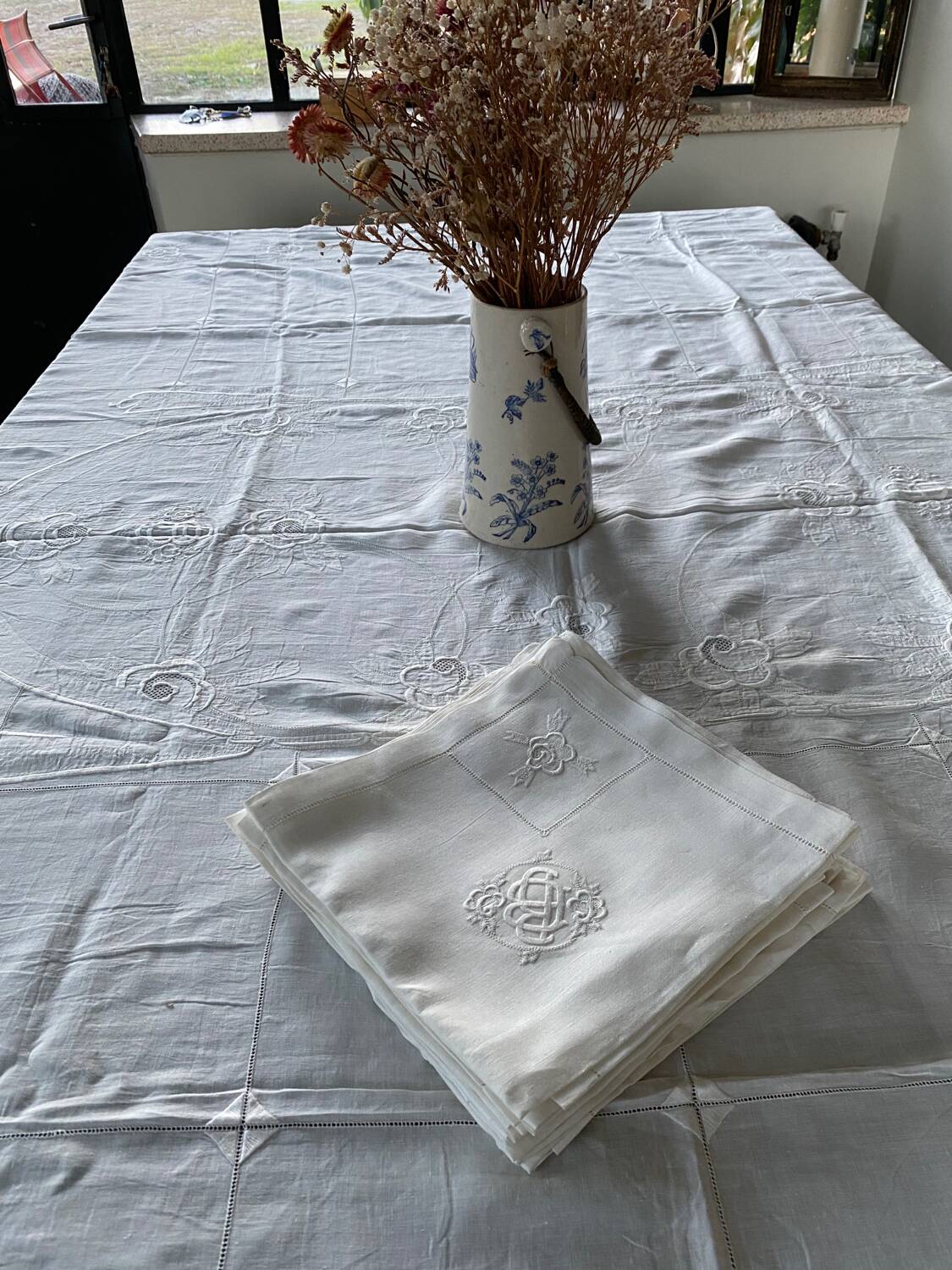 Tablecloth and 12 embroidered and monogrammed napkins