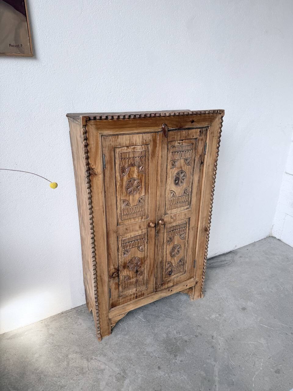Small cabinet in folk art style