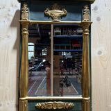 Empire-style mirror in gilded wood