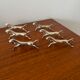 Set of 6 vintage galloping horse knife rests in silver-plated metal.