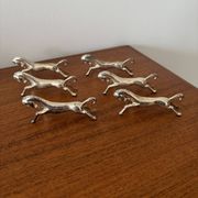 Set of 6 vintage galloping horse knife rests in silver-plated metal.