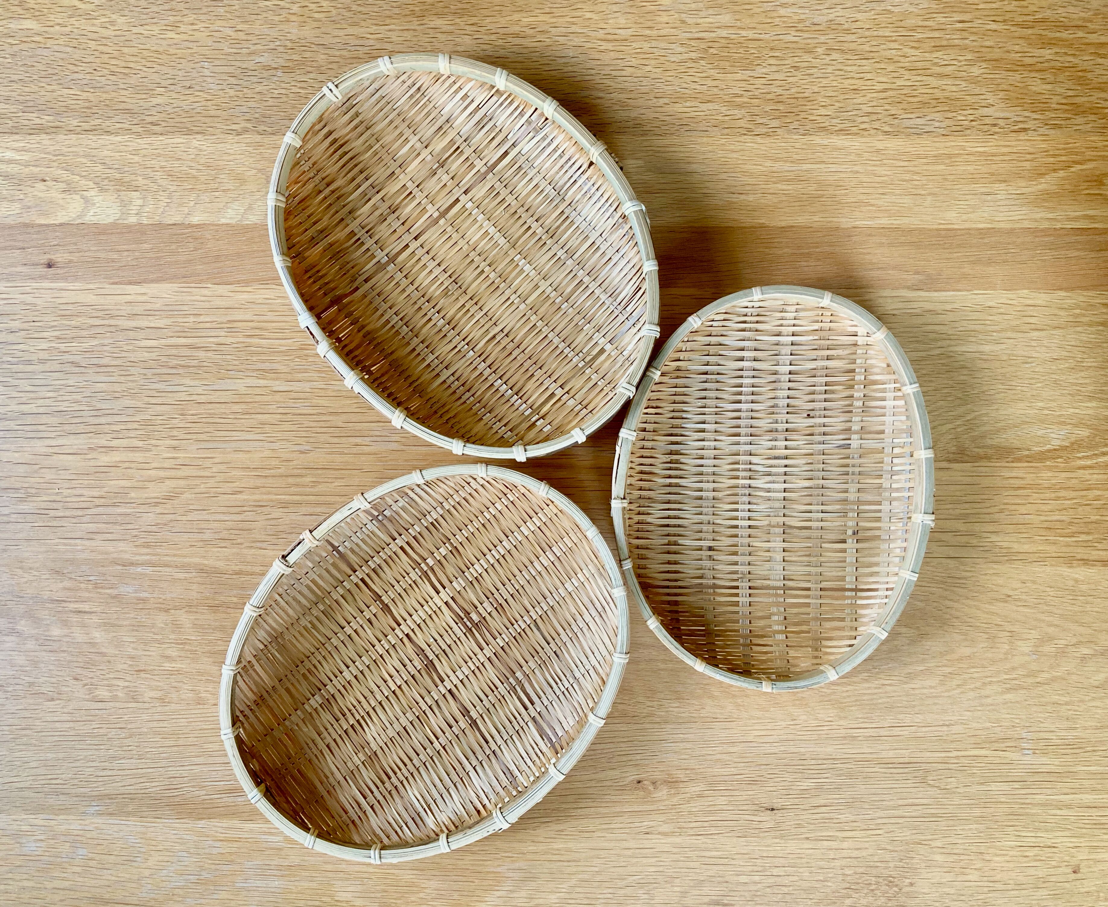Three trundle baskets