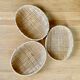 Three trundle baskets