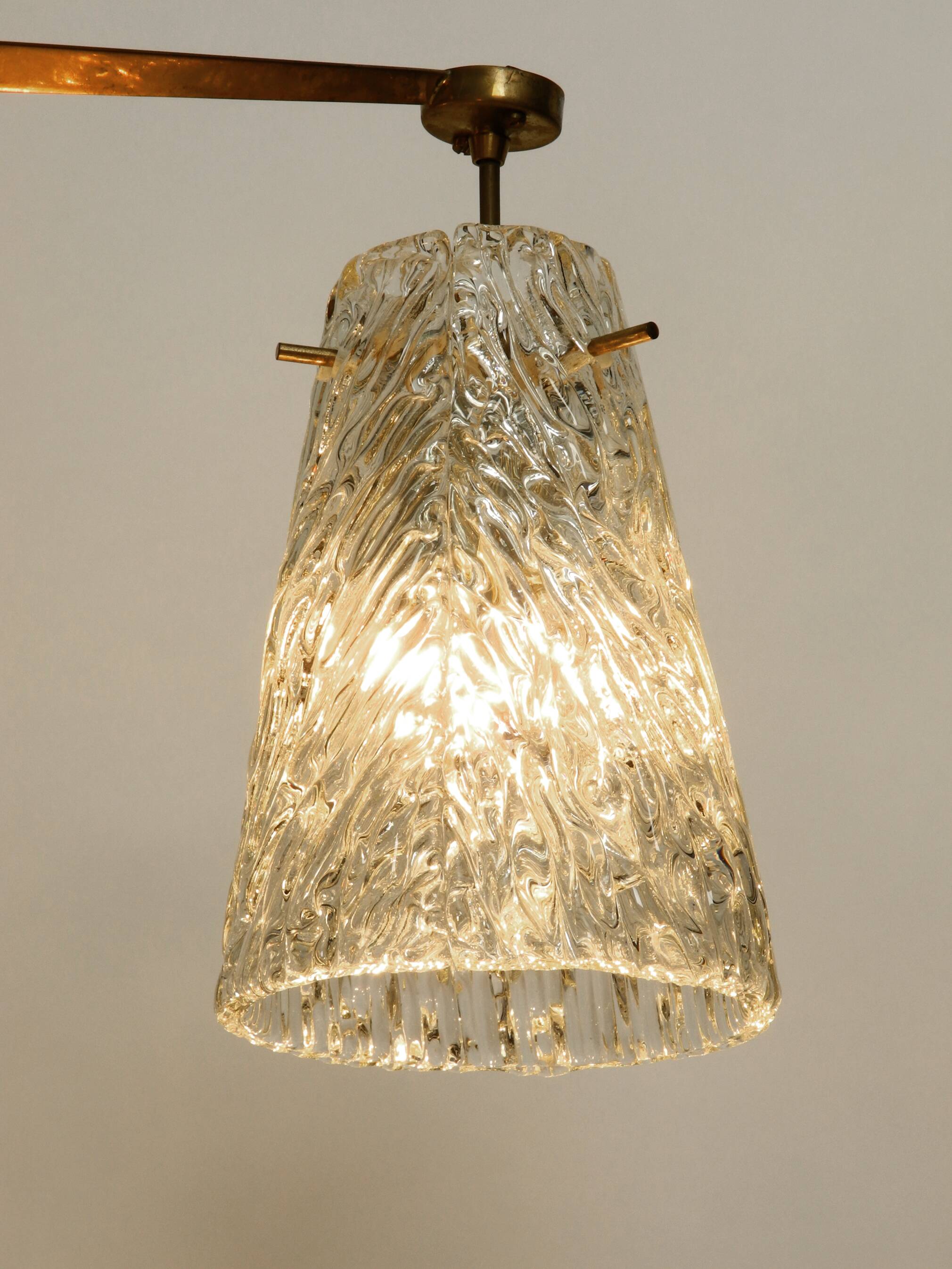 Heavy Mid Century ceiling lamp with three glass shades by Rupert Nikoll