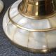 Set of 2 mother-of-pearl candlesticks and brass
