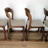 Set of 4 vintage Baumann "Sled" chairs in bent wood.