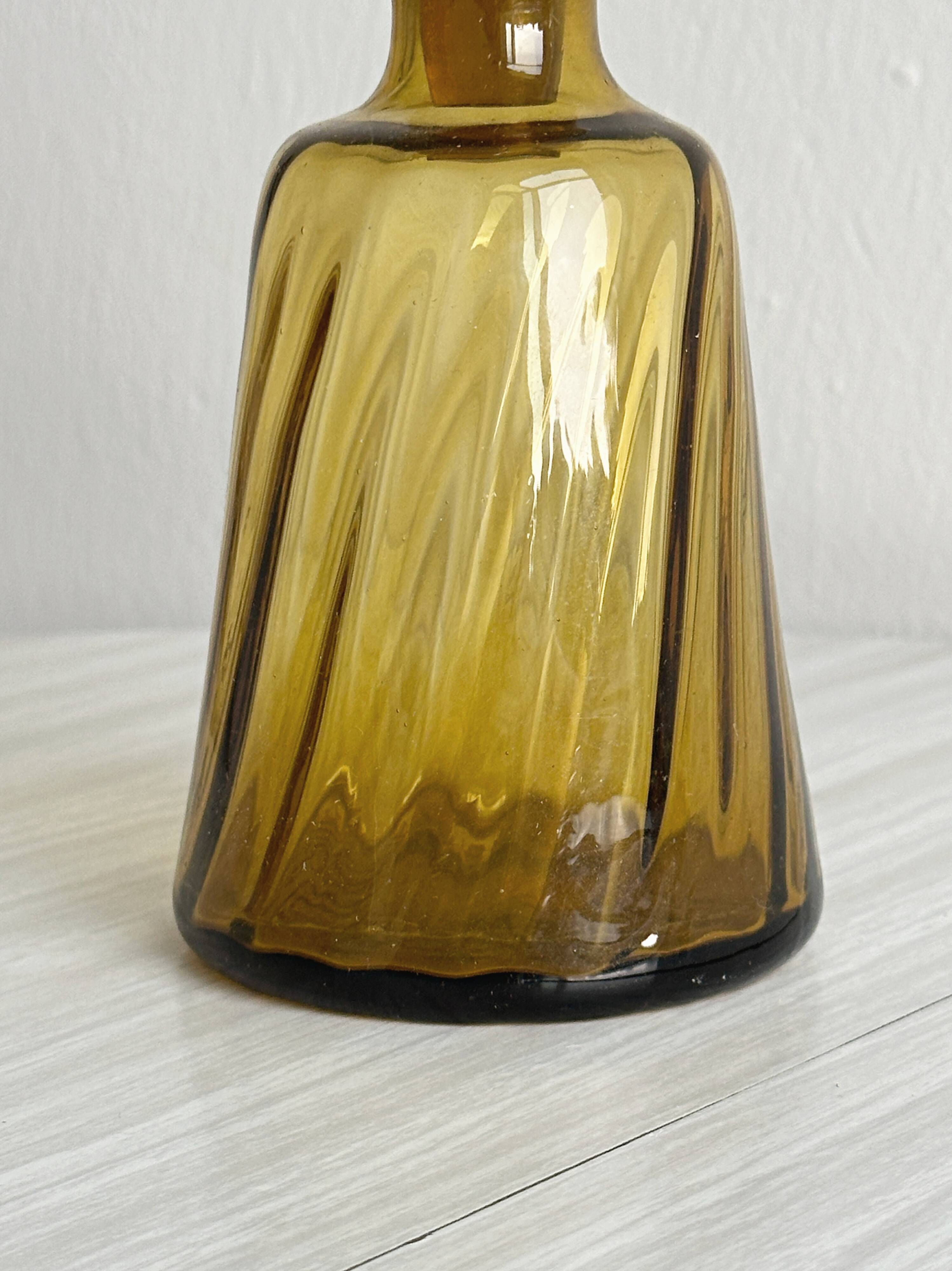 Twisted amber glass carafe