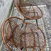Paire de fauteuils en rotin, pieds métal CIRCA 1950