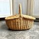 Woven wicker picnic basket