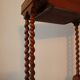 Pedestal table in wood and havana coloured leather tray