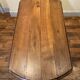 Table with oval shutter in walnut foot turned