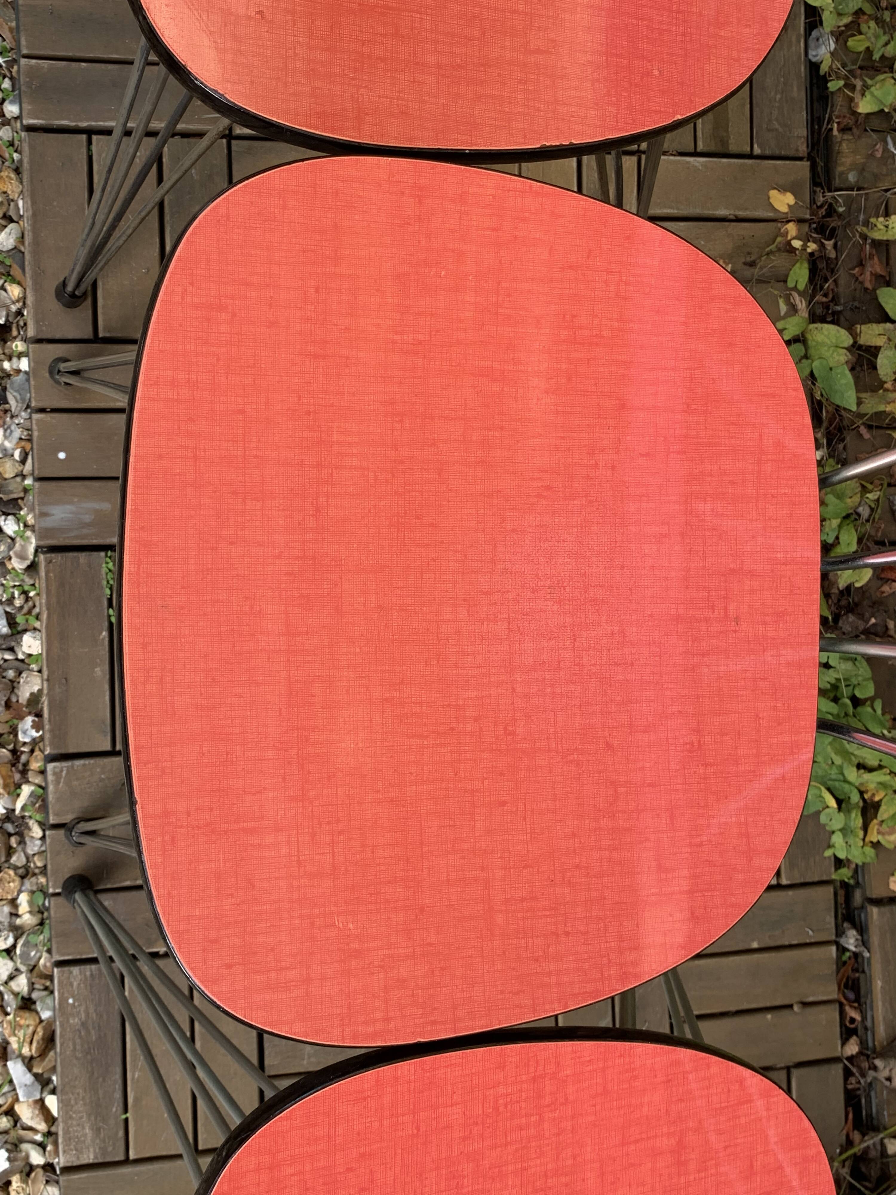 4 red Formica chairs with Eiffel legs, 1950s