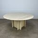 Round travertine coffee table