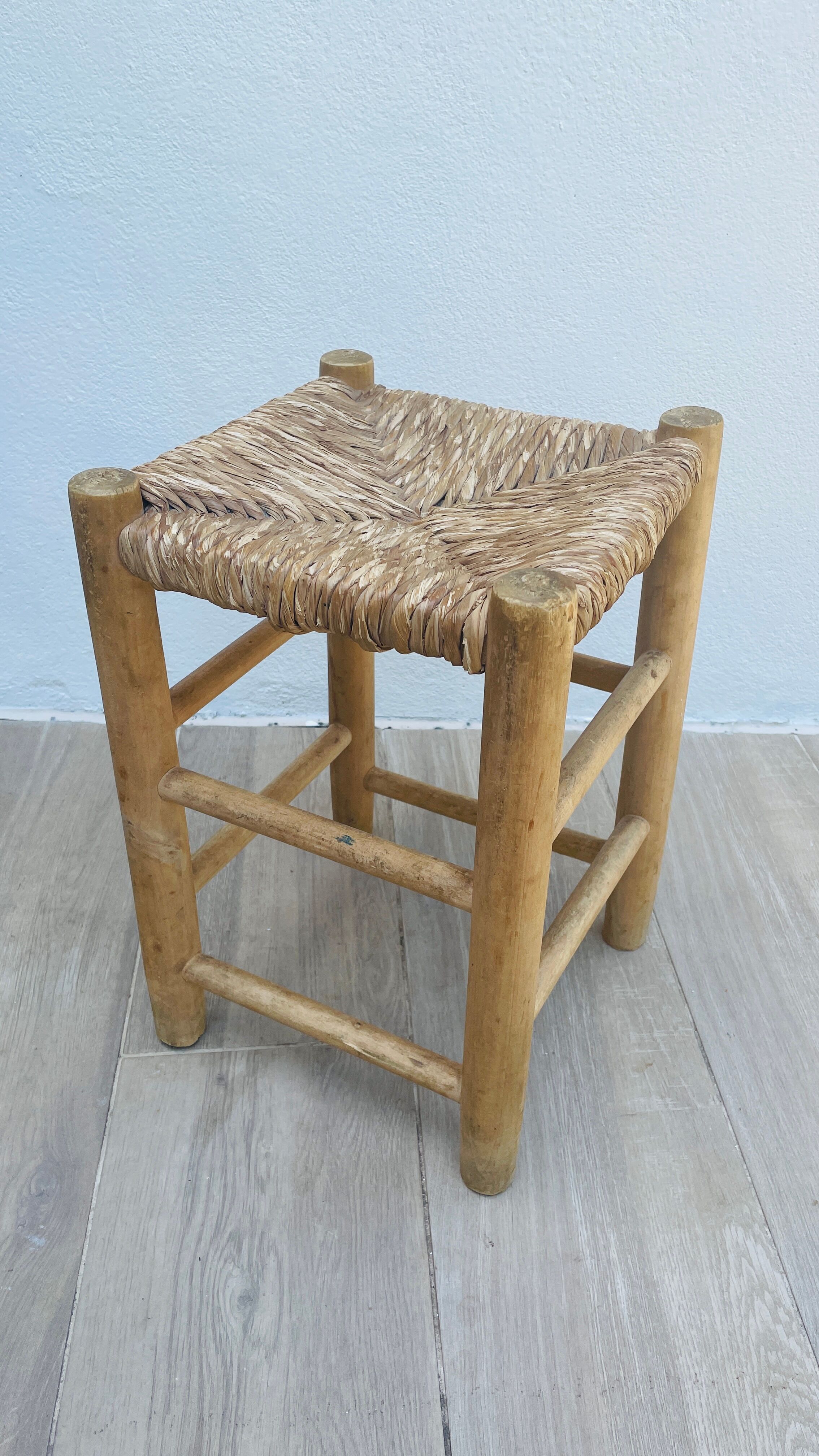 Wooden and straw stool vintage bohemian spirit