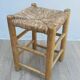 Wooden and straw stool vintage bohemian spirit