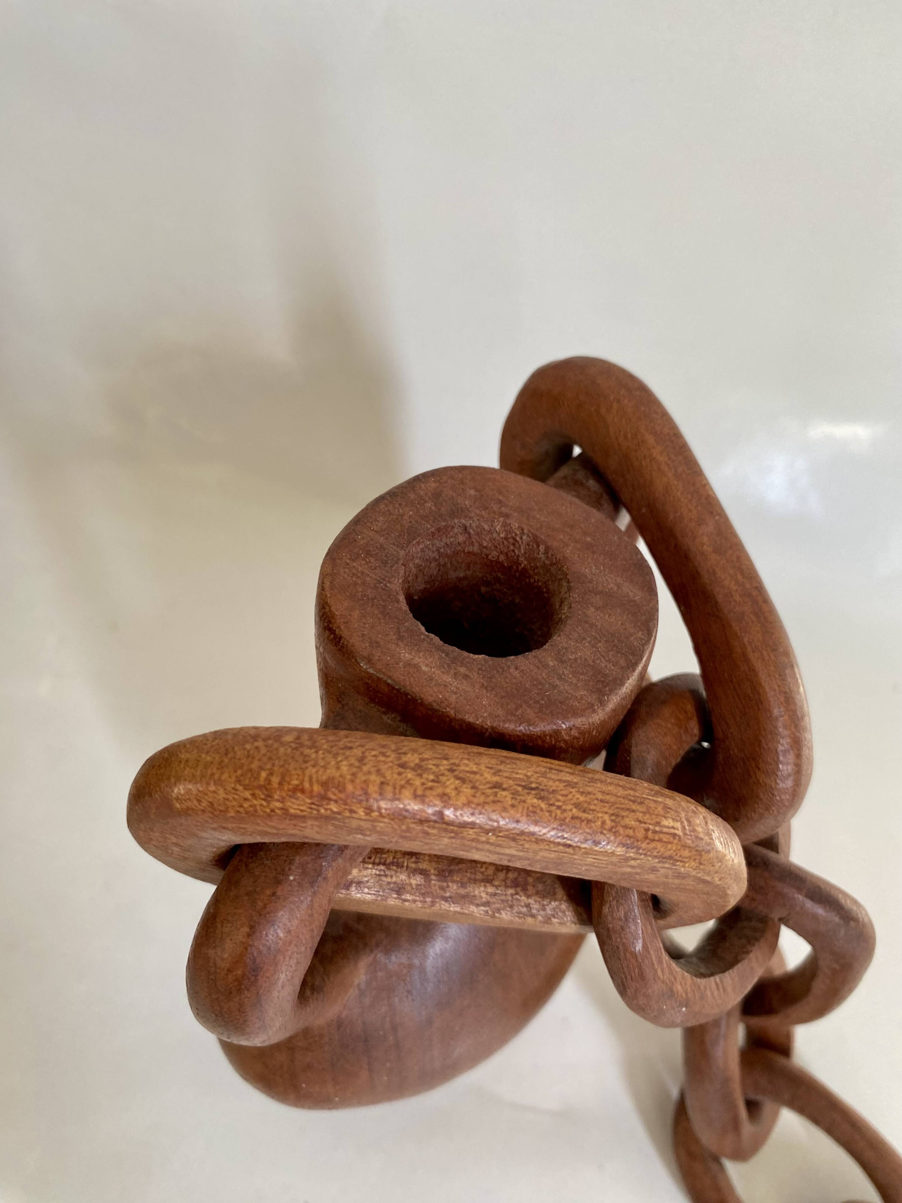 Vase and wooden chain to hang