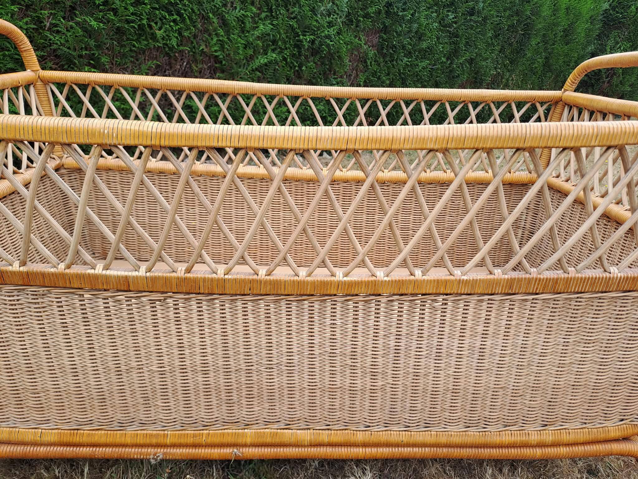 Rattan cradle.