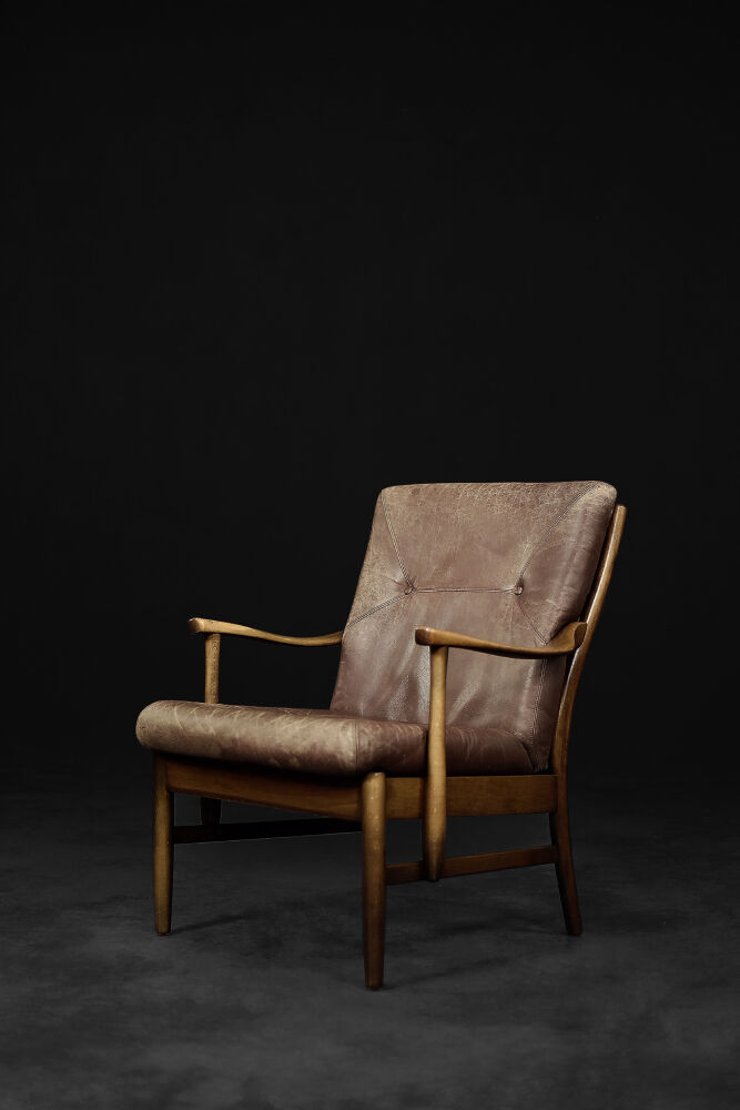 Modern vintage Danish armchair in beech and brown leather by Farstrup Møbler, 1970.