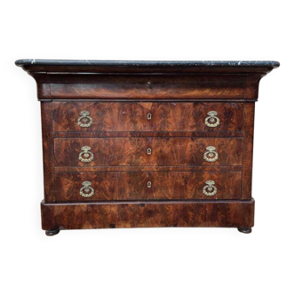 Commode époque restauration en placage d’acajou flammé