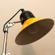 Aluminor desk lamp,vintage 70s, in orange-yellow and black lacquered metal. Good condition.