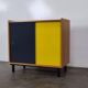 Vintage furniture with coloured glass.