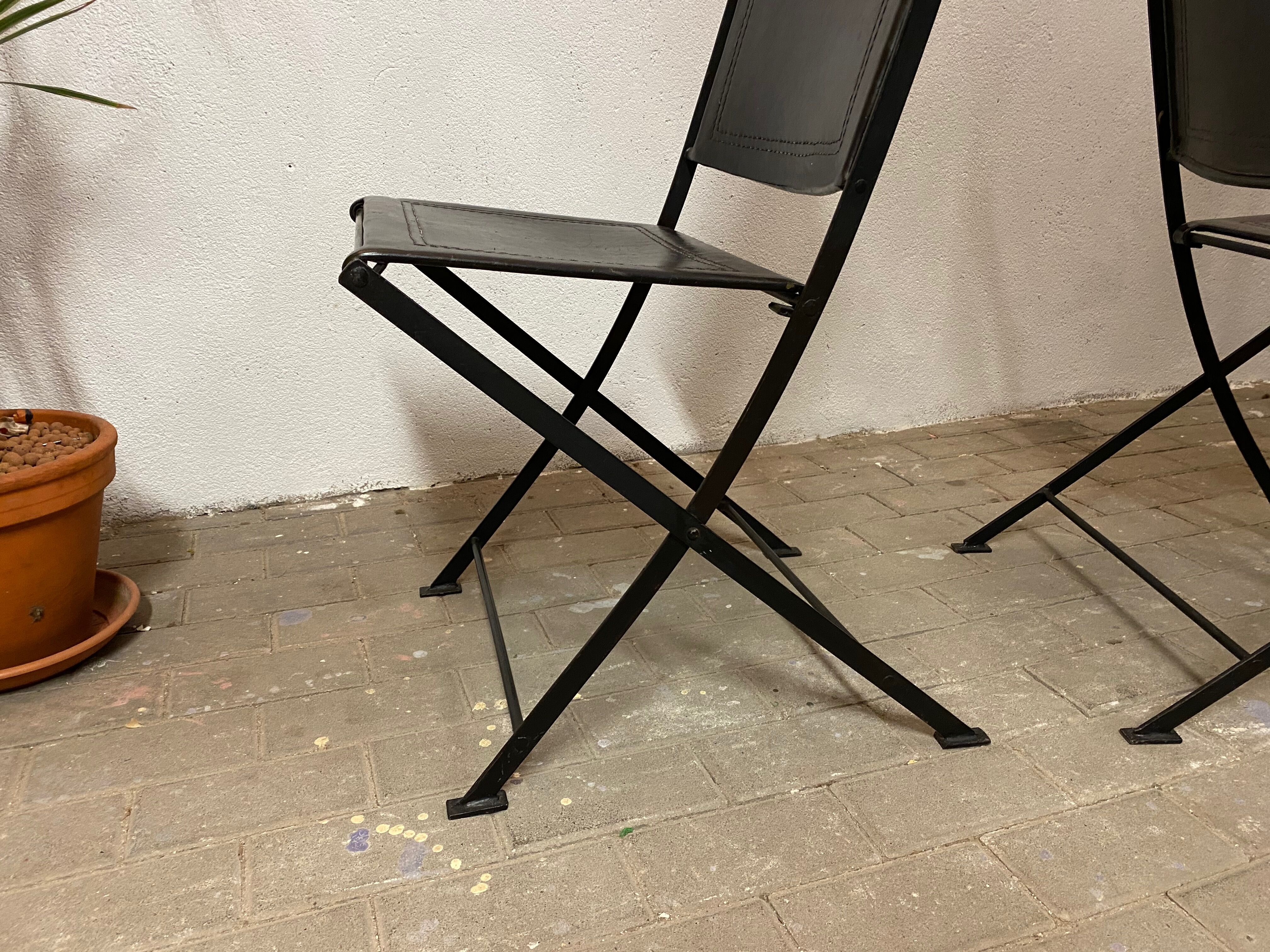 1950s vintage iron folding chairs and leather