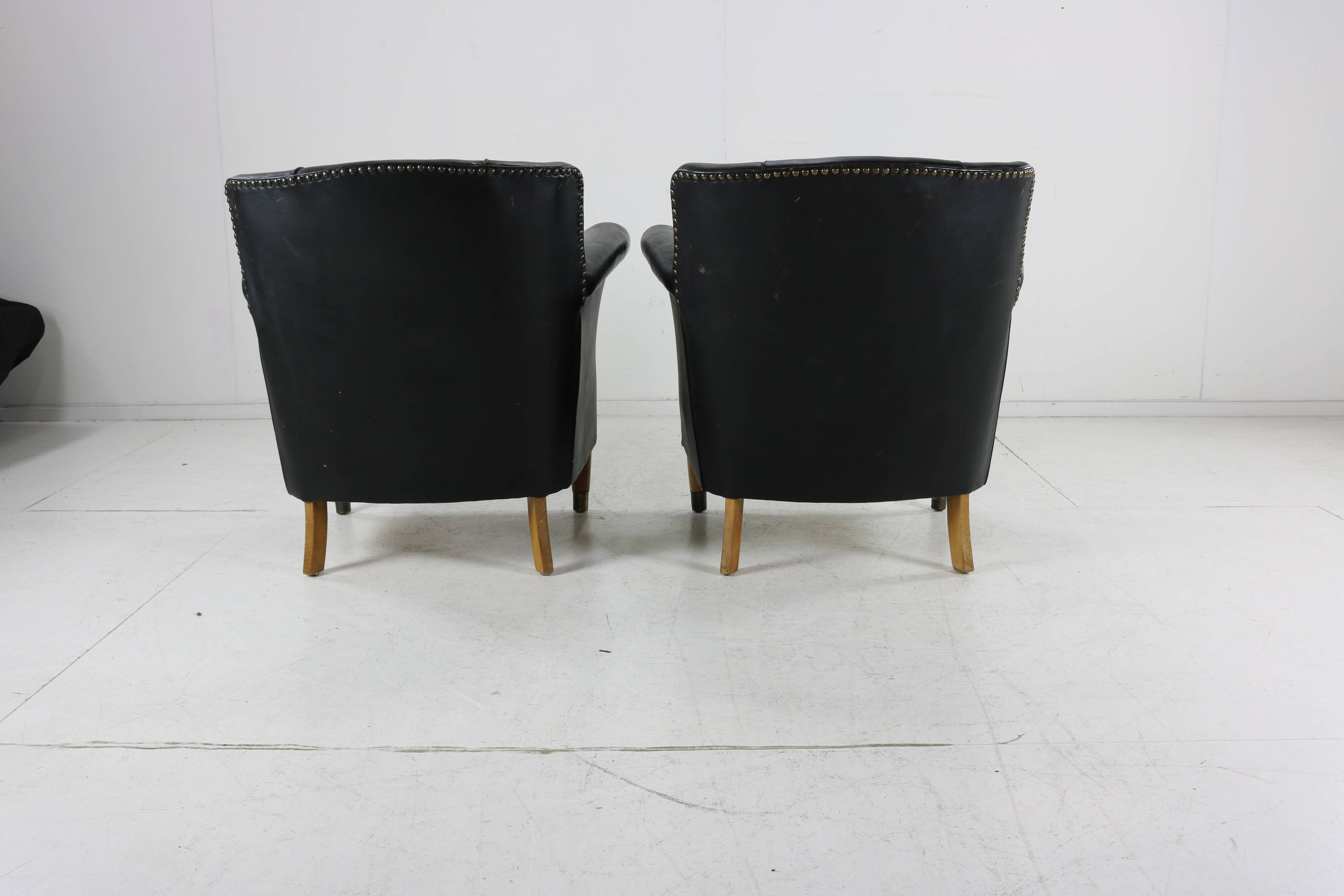 Set of two Danish design leather club chairs
