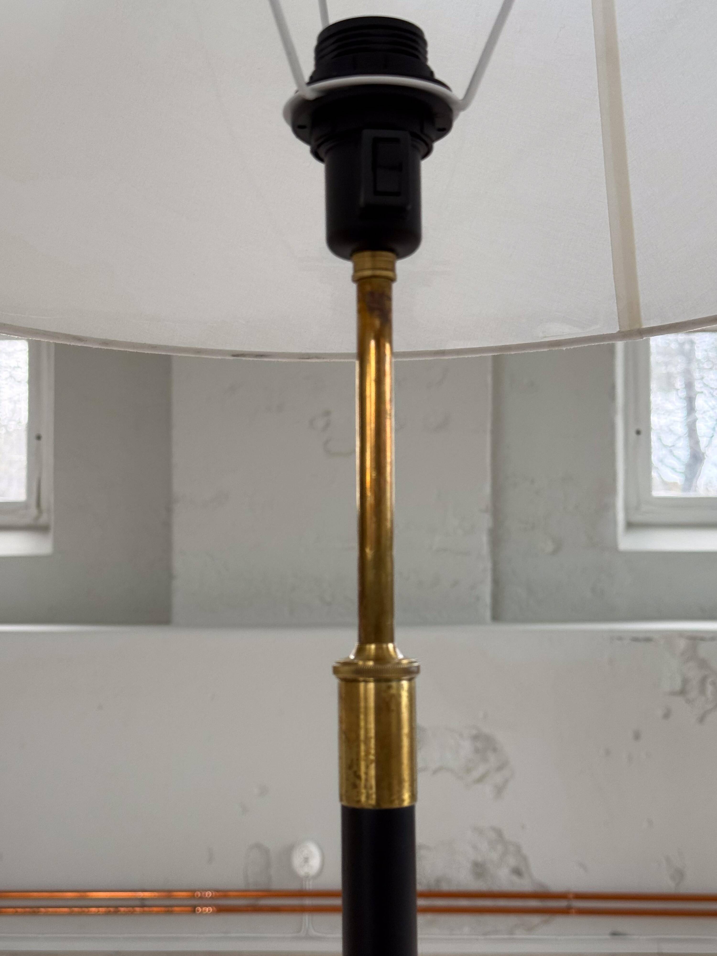 Modern mid-century floor lamp by Aage Petersen, for Le Klint, Denmark, 1970s.