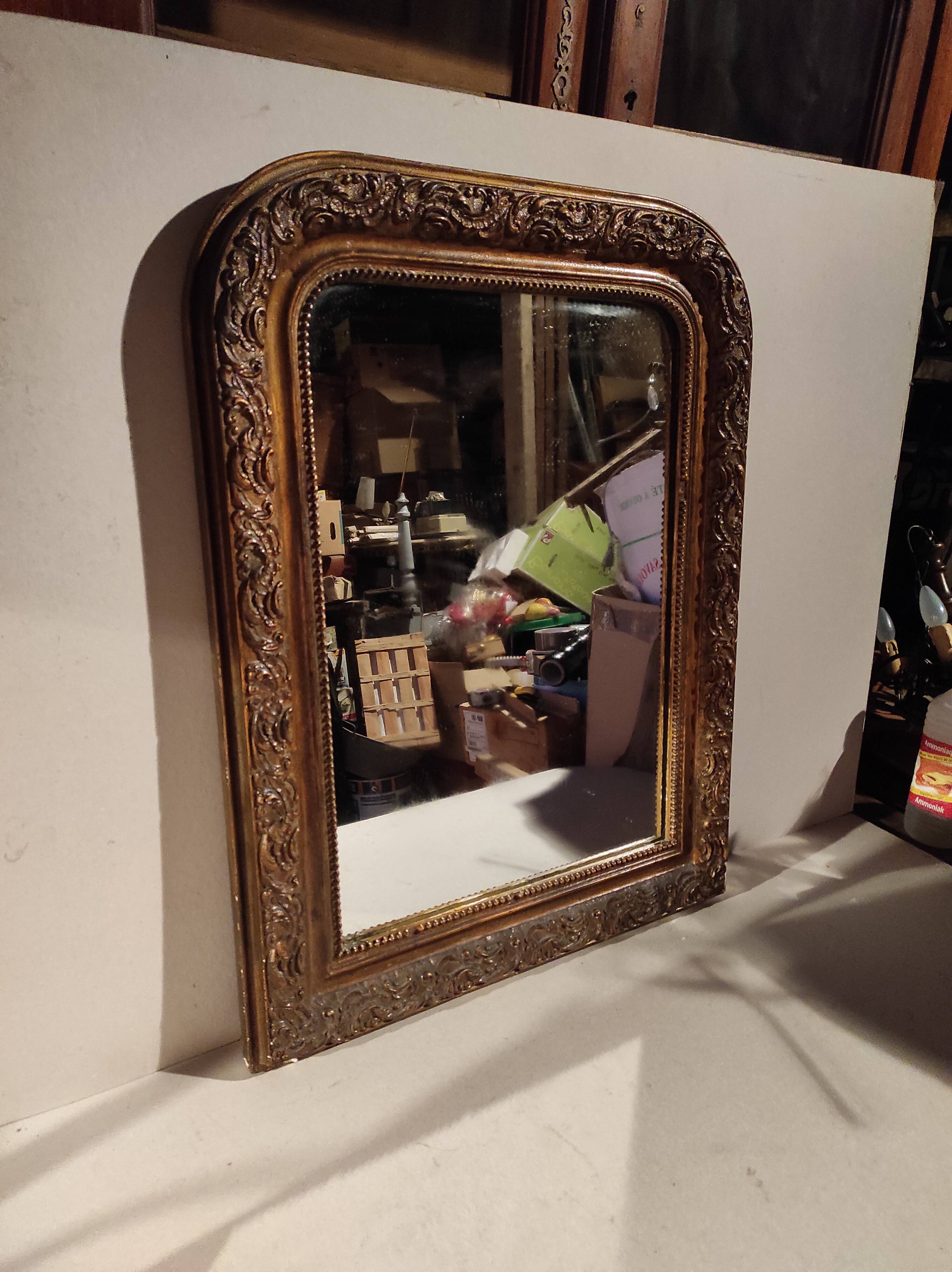 Old Louis Philippe style mirror in wood and plaster with mercury ice cream