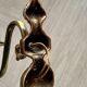 Pair of vintage wall sconces in brass and frosted engraved glass.