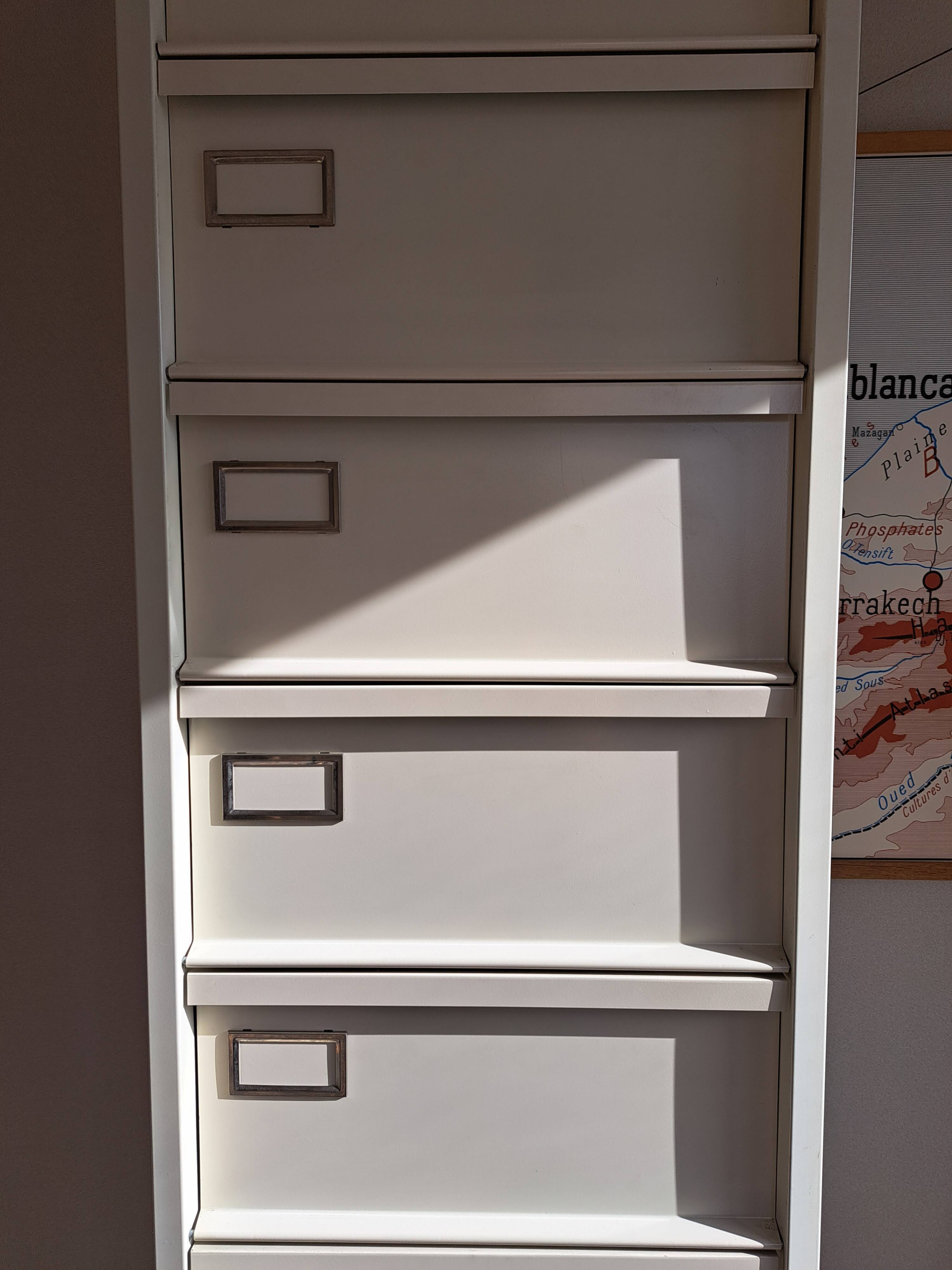 Vintage metal clamshell cabinet