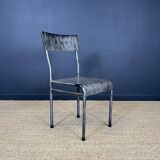 Pair of gray metal industrial chairs