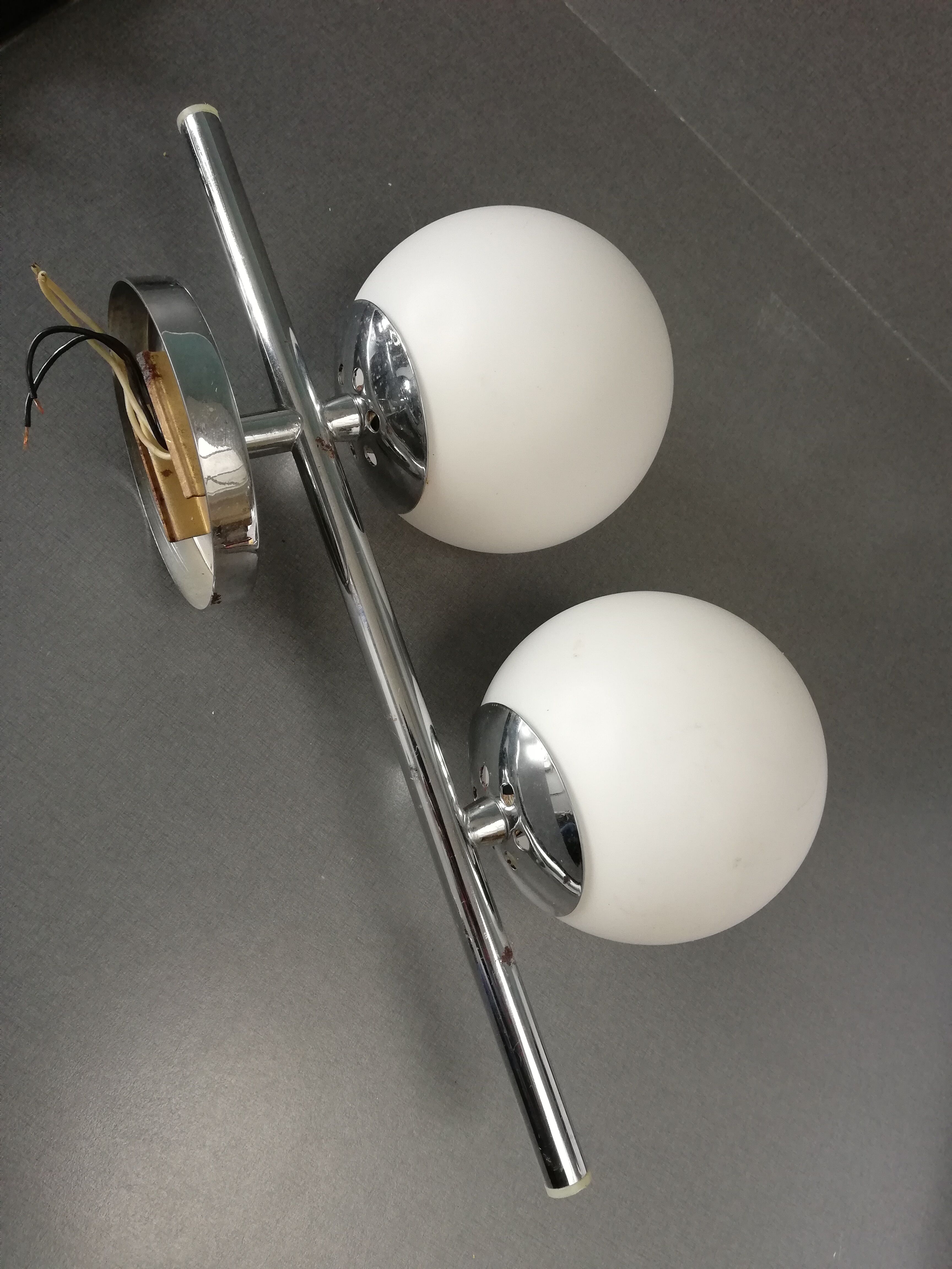 Double chrome metal and opaline balls sconce
