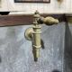 Early 20th-century oak bar counter with period zinc and tin cladding.