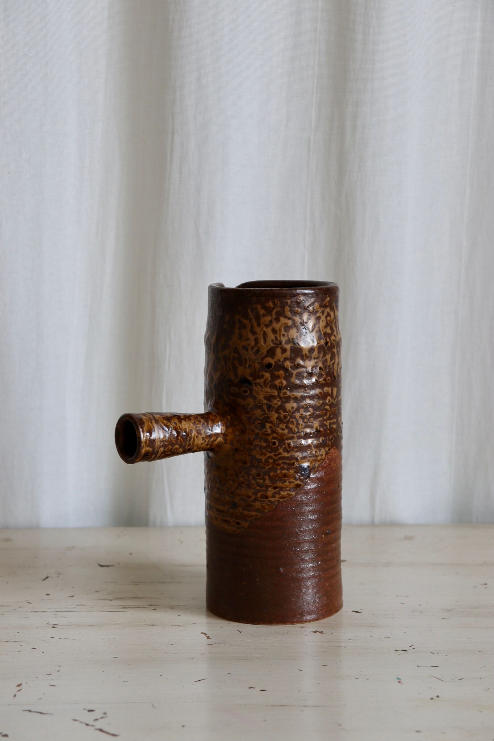 Textured stoneware decanter