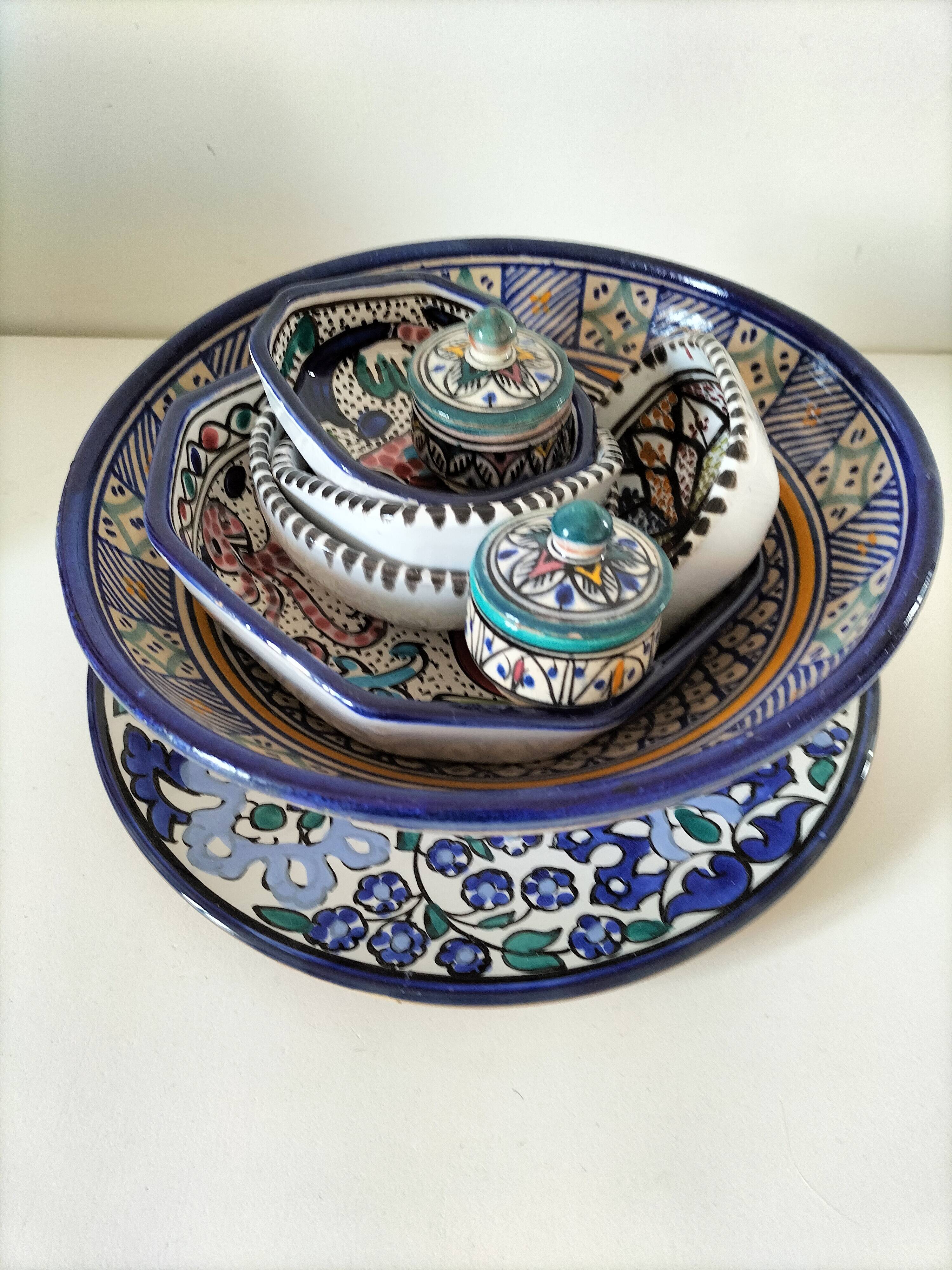 Set of 9 hand-painted Tunisian ceramics.