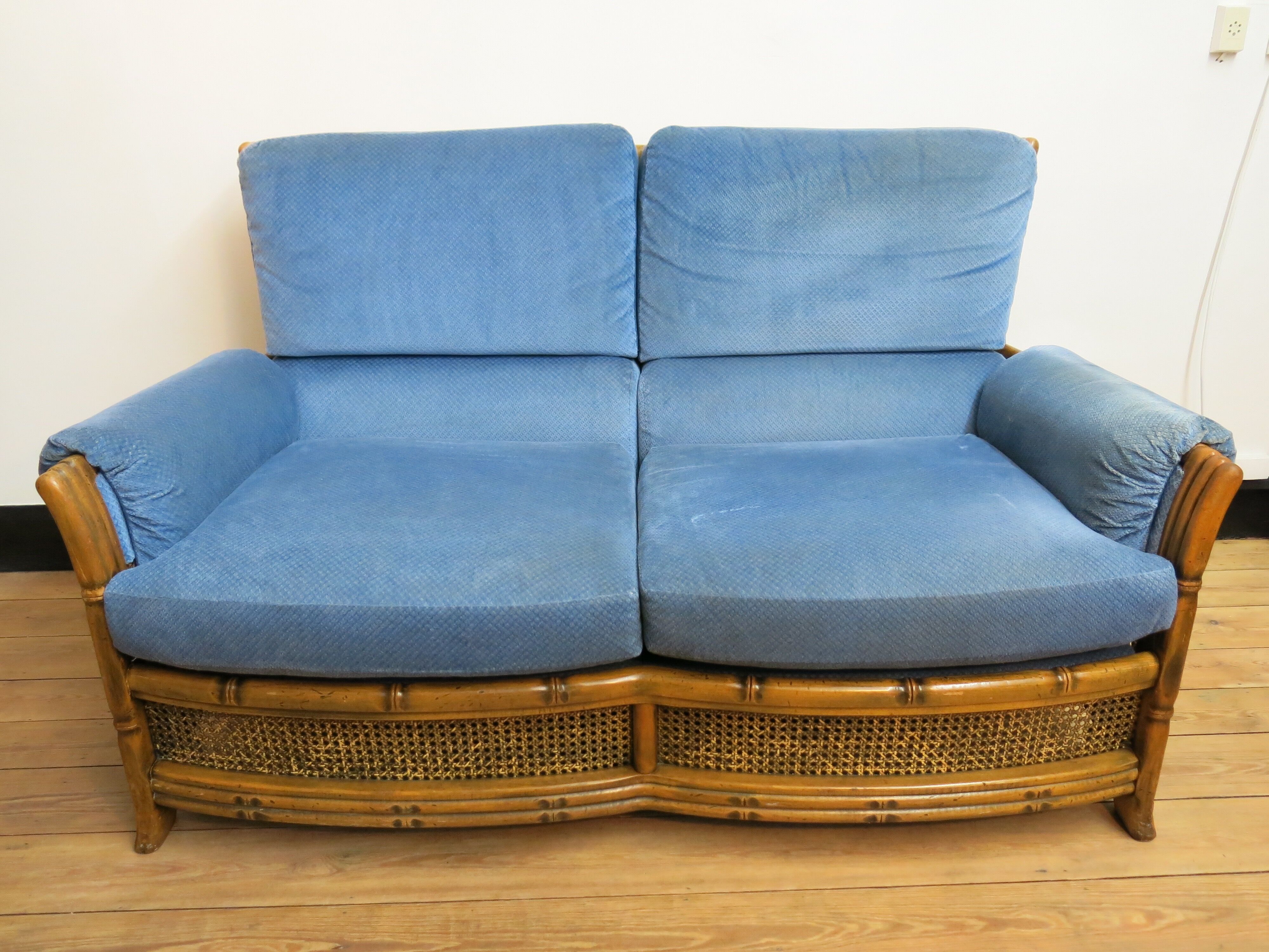 Colonial sofa two places in cannage and carved wood