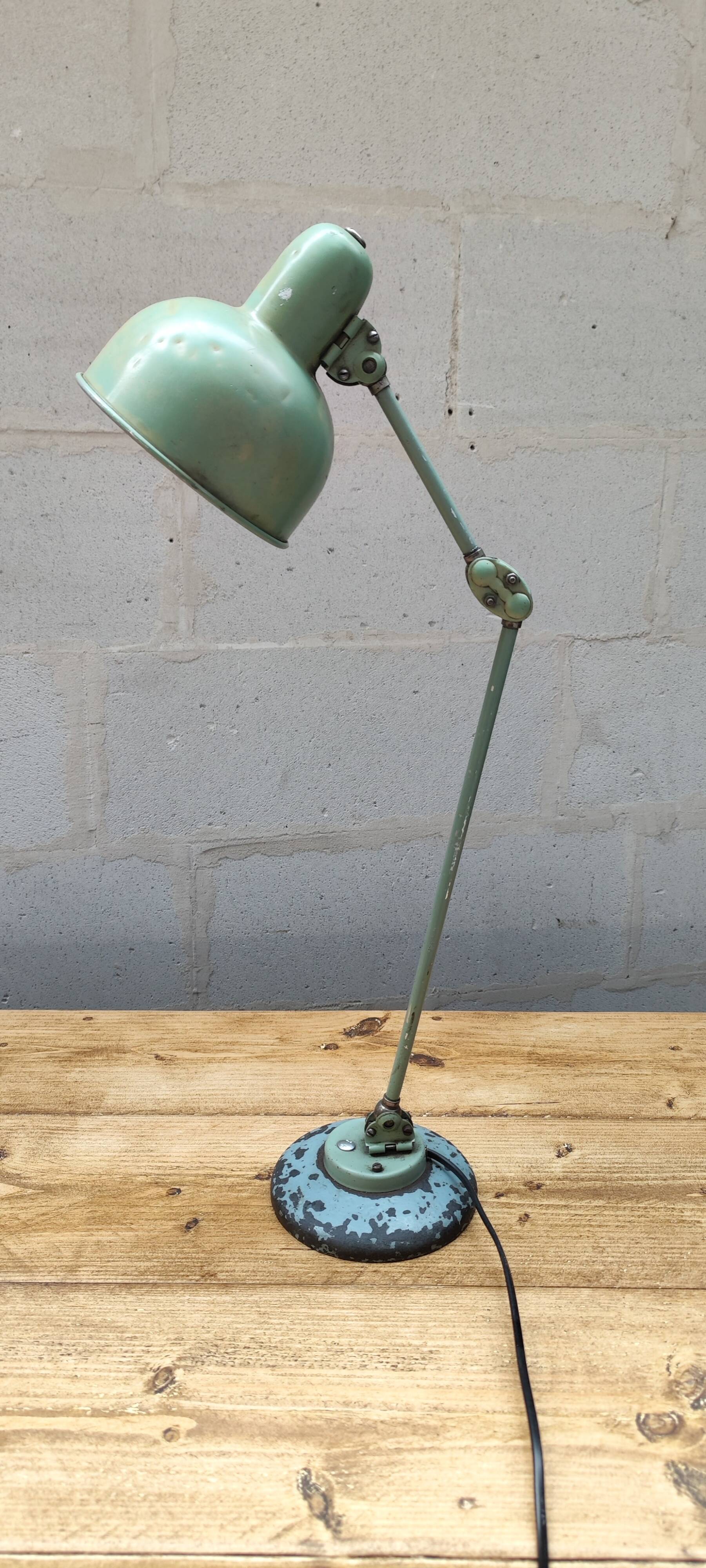 Old green industrial desk lamp