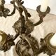 Pair of antique bronze candlesticks at the end of the table XIXth