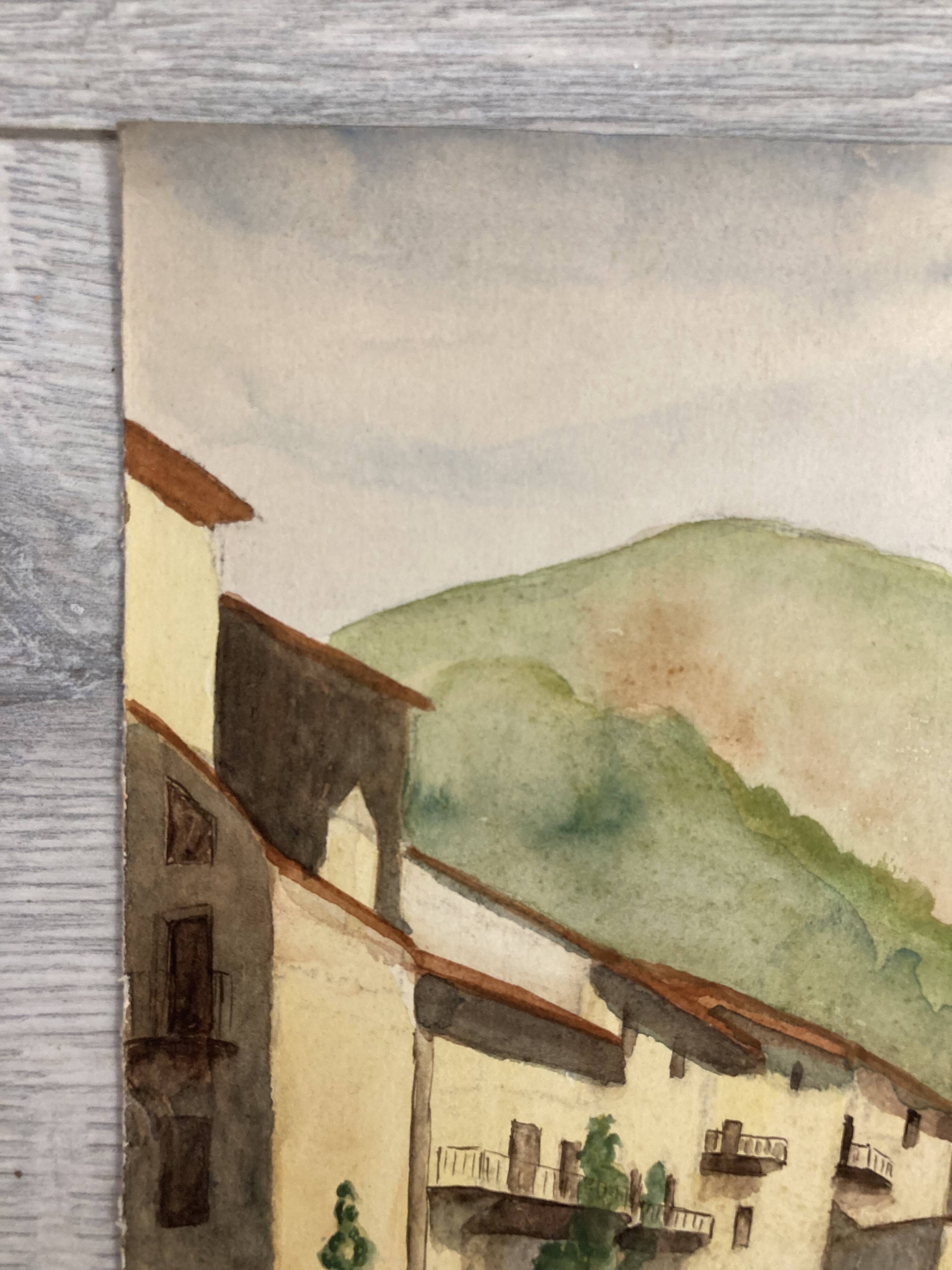 Signed watercolor of landscape with bell tower