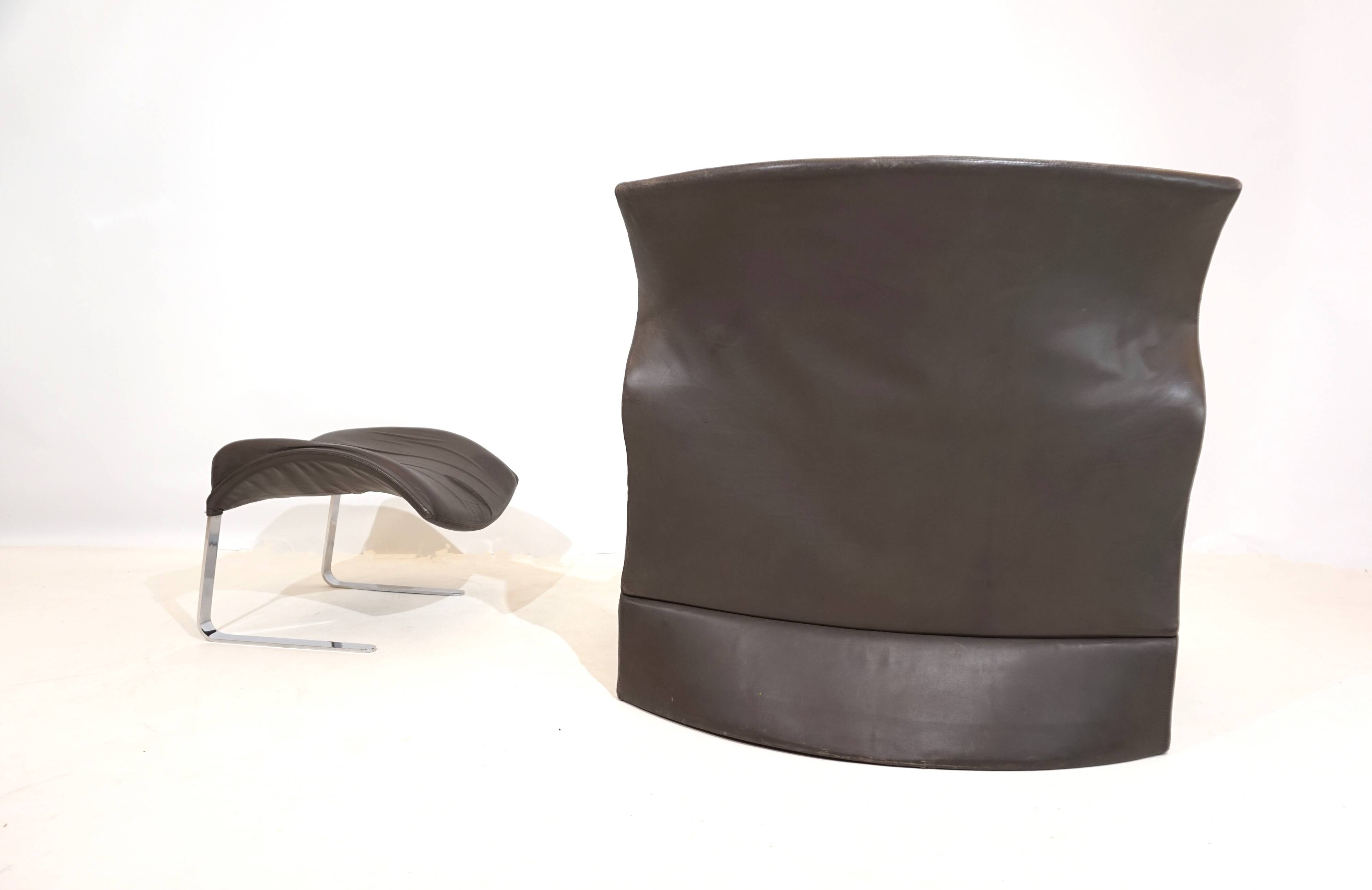 Saporiti Vela Alta leather armchair with ottoman by Giovanni Offredi
