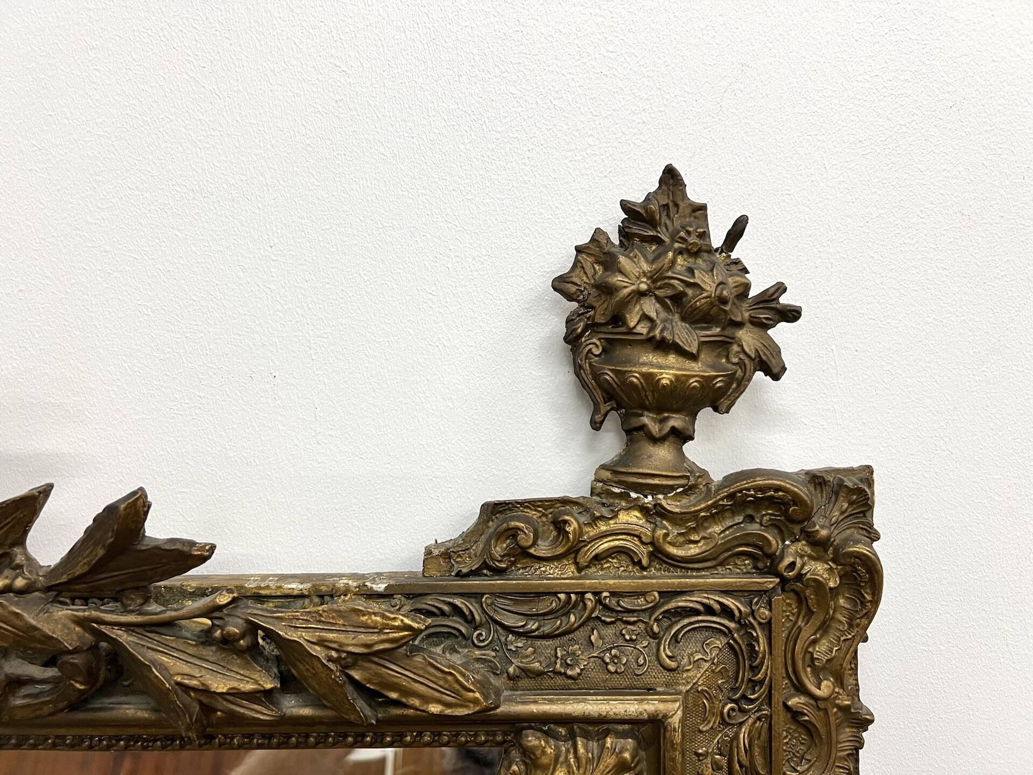 Large antique pediment mirror with mouldings.