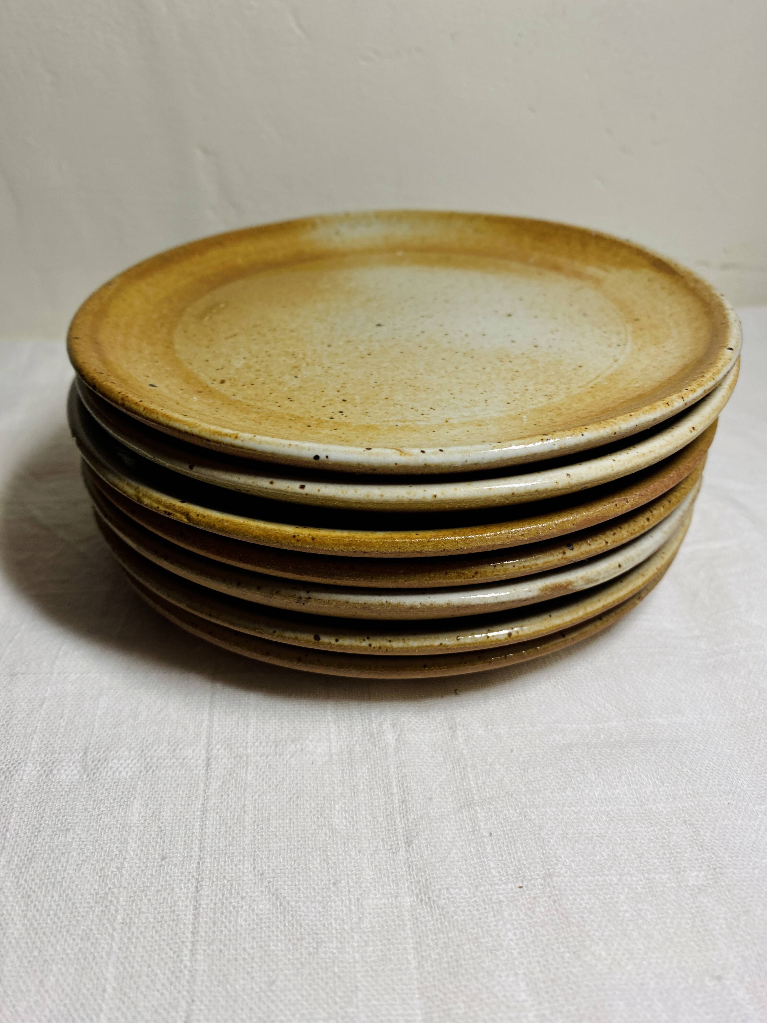 7 assiettes à dessert vintage en grès