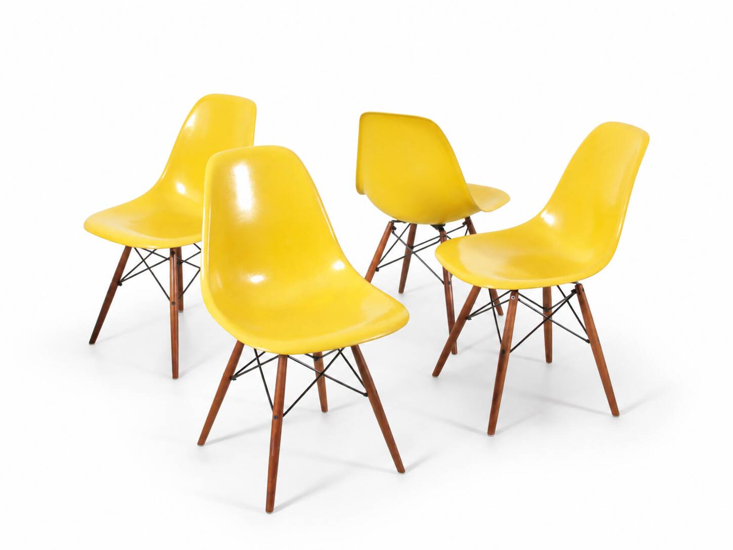 Set of 4 DSW chairs by Charles Eames - yellow fibreglass edition by Herman.